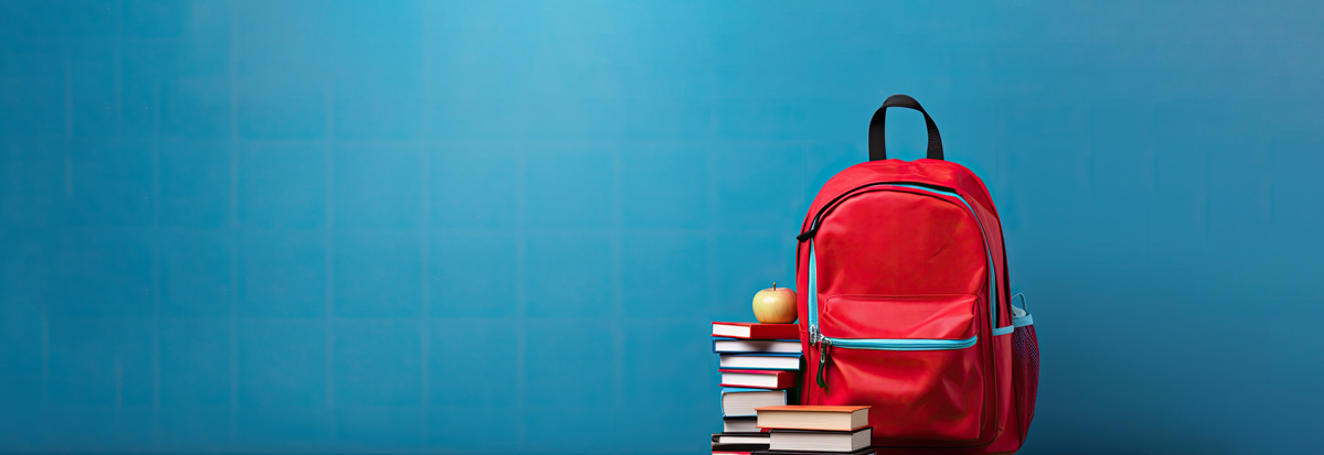 caritas-schule-mariannhill-anmelden-roter-schulrucksack-buecher